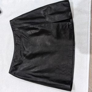 Bebe black leather mini skirt